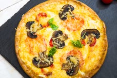 Background of pizza with mushrooms. Fresh italian classic pizza Royalty Free Stock Photos Background of pizza with mushrooms. Fresh italian classic pizza Royalty Free Stock Photos