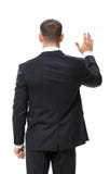 Backview der wellenartig bewegenden Hand des Geschäftsmannes stockfoto Backview der wellenartig bewegenden Hand des Geschäftsmannes stockfoto