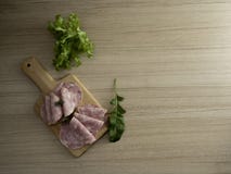 bacon sliced on a wooden background stock image bacon sliced on a wooden background stock image