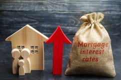 Bag with the money and the word Mortgage interest rates and up arrow with family and home. Raising mortgage rates and tax. The royalty free stock photo Bag with the money and the word Mortgage interest rates and up arrow with family and home. Raising mortgage rates and tax. The royalty free stock photo