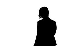 Baile joven confiado adorable de la mujer de negocios de la silueta metrajes Baile joven confiado adorable de la mujer de negocios de la silueta metrajes