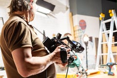 Bak platserna av video produktion- eller videoskytte royaltyfri fotografi Bak platserna av video produktion- eller videoskytte royaltyfri fotografi