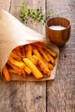 Baked butternut squash fries with sea salt, pumpkin chips royalty free stock photography Baked butternut squash fries with sea salt, pumpkin chips royalty free stock photography