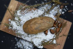Baked potato on rock salt stock photo Baked potato on rock salt stock photo