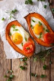 Baked Yam Filling With Egg And Tomato Close-up On The Table. Vertical Top View Stock Image Baked Yam Filling With Egg And Tomato Close-up On The Table. Vertical Top View Stock Image