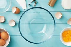 Baking background with eggs and utensils for step by step recipe of meringue. stock photo Baking background with eggs and utensils for step by step recipe of meringue. stock photo