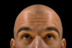 Bald man thinking
