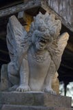 Balinese grey stone statue. Kintamani Highland temple royalty free stock images Balinese grey stone statue. Kintamani Highland temple royalty free stock images