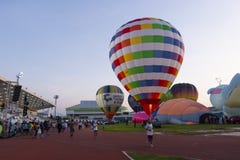 Balloon festival in stadium at daytime Stock Photography Balloon festival in stadium at daytime Stock Photography