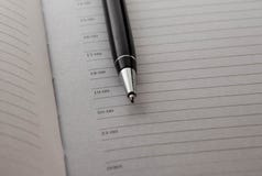 ballpoint op Blocnoteachtergrond stock foto ballpoint op Blocnoteachtergrond stock foto