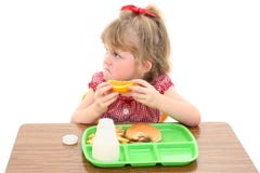 Bambina adorabile insoddisfatta della refezione fotografia stock Bambina adorabile insoddisfatta della refezione fotografia stock