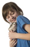 Bambina felice con il suo istrice pigmeo africano dell'animale domestico fotografie stock Bambina felice con il suo istrice pigmeo africano dell'animale domestico fotografie stock