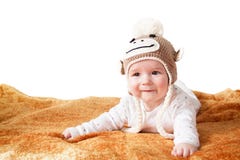 Bambino in cappello della scimmia fotografia stock libera da diritti Bambino in cappello della scimmia fotografia stock libera da diritti