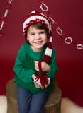 Bambino di Natale in Santa Elf Hat Fotografia Stock Libera da Diritti Bambino di Natale in Santa Elf Hat Fotografia Stock Libera da Diritti