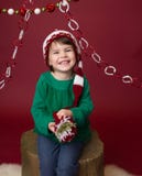 Bambino di Natale in Santa Elf Hat Fotografie Stock Libere da Diritti Bambino di Natale in Santa Elf Hat Fotografie Stock Libere da Diritti