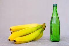 Bananas light Breakfast. Mineral water Fruit drinks to the table. Food for a healthy lifestyle. stock images Bananas light Breakfast. Mineral water Fruit drinks to the table. Food for a healthy lifestyle. stock images