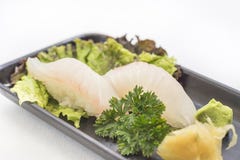Banda nera con il pesce bianco Nigiri immagini stock libere da diritti Banda nera con il pesce bianco Nigiri immagini stock libere da diritti