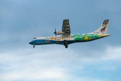 Bangkok Air ATR 72-500 is descending for landing stock image Bangkok Air ATR 72-500 is descending for landing stock image