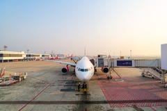 Airport ramp service for for a commercial plane landing stock photography Airport ramp service for for a commercial plane landing stock photography