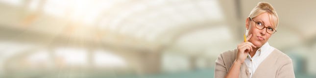 Banner of Beautiful Contemplative Student or Businesswoman with Pencil Royalty Free Stock Photo Banner of Beautiful Contemplative Student or Businesswoman with Pencil Royalty Free Stock Photo