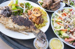 Barbecued Trigger Fish And Ribs Served With Salad Royalty Free Stock Photo Barbecued Trigger Fish And Ribs Served With Salad Royalty Free Stock Photo