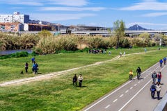 Barcelona, Spain - March 21, 2021. Promenade and bicycle lane on the banks of the Besos river, Sant Adriá in Barcelona