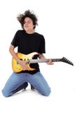 Barefoot Teen Playing Electric Guitar Over White