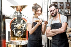 Baristas checking the quality of coffee Stock Image Baristas checking the quality of coffee Stock Image