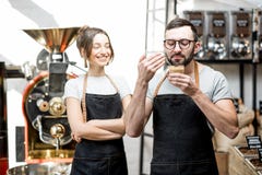 Baristas checking the quality of coffee Royalty Free Stock Photography Baristas checking the quality of coffee Royalty Free Stock Photography