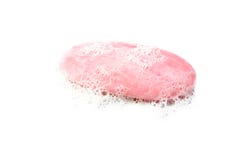 Barre de savon rose avec la mousse d'isolement sur le blanc photographie stock Barre de savon rose avec la mousse d'isolement sur le blanc photographie stock