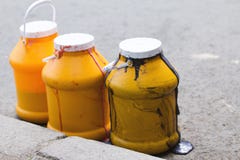 Barrels with foul wasted melting ice cream stock images Barrels with foul wasted melting ice cream stock images