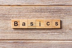 BASICS word written on wood block. BASICS text on table, concept stock photography BASICS word written on wood block. BASICS text on table, concept stock photography