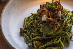 Basil Pesto Pasta with a neat style stock image Basil Pesto Pasta with a neat style stock image