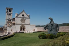 The Basilica of St Francis San Francesco and the statue of St Francis on a horse, Assisi, Italy stock image The Basilica of St Francis San Francesco and the statue of St Francis on a horse, Assisi, Italy stock image
