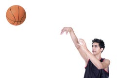 Basketball Player Throwing The Ball Stock Images