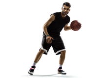 Basketball-Spieler in der Aktion lokalisiert auf Weiß lizenzfreie stockfotografie Basketball-Spieler in der Aktion lokalisiert auf Weiß lizenzfreie stockfotografie