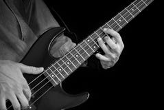 Bass Guitar In Hands Royalty Free Stock Image