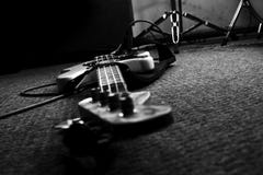 Bass Guitar In Music Studio. Musical Instruments And Equipment Royalty Free Stock Photography