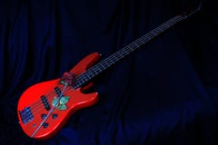 Bass Rose Guitar rosso fotografia stock Bass Rose Guitar rosso fotografia stock
