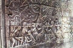 Bassorilievo delle sculture di bassorilievo della Cambogia Angkor Bayon in Siem Reap fotografia stock libera da diritti Bassorilievo delle sculture di bassorilievo della Cambogia Angkor Bayon in Siem Reap fotografia stock libera da diritti