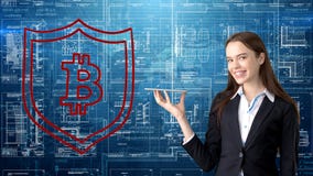 Bauty business woman standing in suit with Bitcoin Logo to illustrate the use of bitcoin for trading or money transfer. stock photo Bauty business woman standing in suit with Bitcoin Logo to illustrate the use of bitcoin for trading or money transfer. stock photo