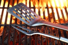 BBQ Tools On The Hot Grill Royalty Free Stock Photography
