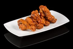 BBQ WINGS  On Black Background With Reflection Royalty Free Stock Images