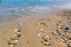 Beach scene, rocks and small waves, tranquil landscape of the coast royalty free stock photo Beach scene, rocks and small waves, tranquil landscape of the coast royalty free stock photo