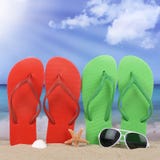 Beach scene with sandals sun in summer vacation royalty free stock images Beach scene with sandals sun in summer vacation royalty free stock images
