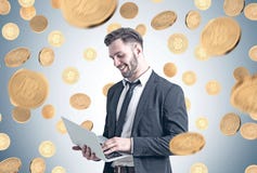 Bearded businessman with laptop, coins royalty free stock photos Bearded businessman with laptop, coins royalty free stock photos