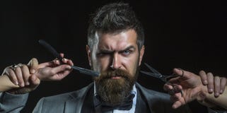 Bearded man, bearded male. Portrait beard man. Barber scissors and straight razor, barber shop. Vintage barbershop royalty free stock photography Bearded man, bearded male. Portrait beard man. Barber scissors and straight razor, barber shop. Vintage barbershop royalty free stock photography