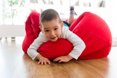 Beatiful young boy looking at camera at home. stock photos Beatiful young boy looking at camera at home. stock photos