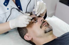 Beautician procedure cleansing face men