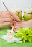 Beautician давая обработку pedicure стоковые изображения Beautician давая обработку pedicure стоковые изображения